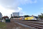  Northbound Brightline Bright Red consist arriving into WPB Station  